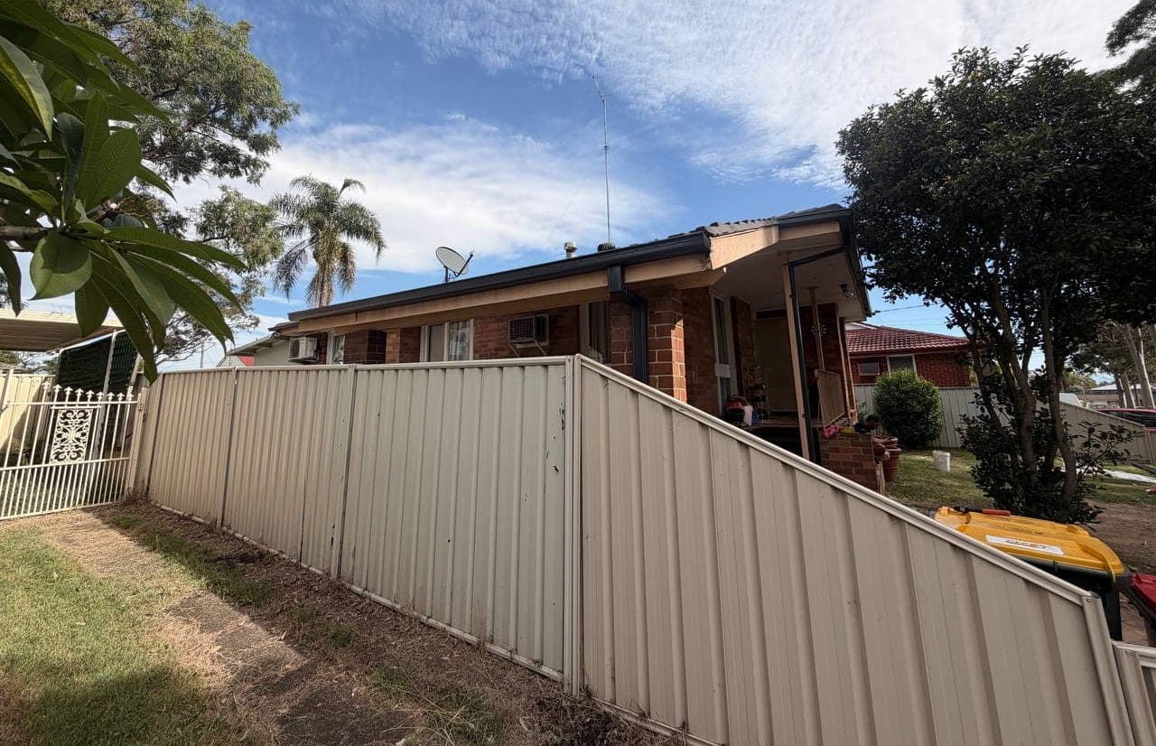 New Colorbond gutter and downpipe replacement Crown Roofers Sydney residential — photo 3 v2