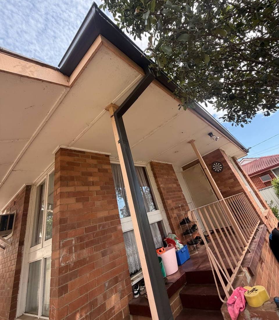 New Colorbond gutter and downpipe replacement Crown Roofers Sydney residential — photo 5 v2