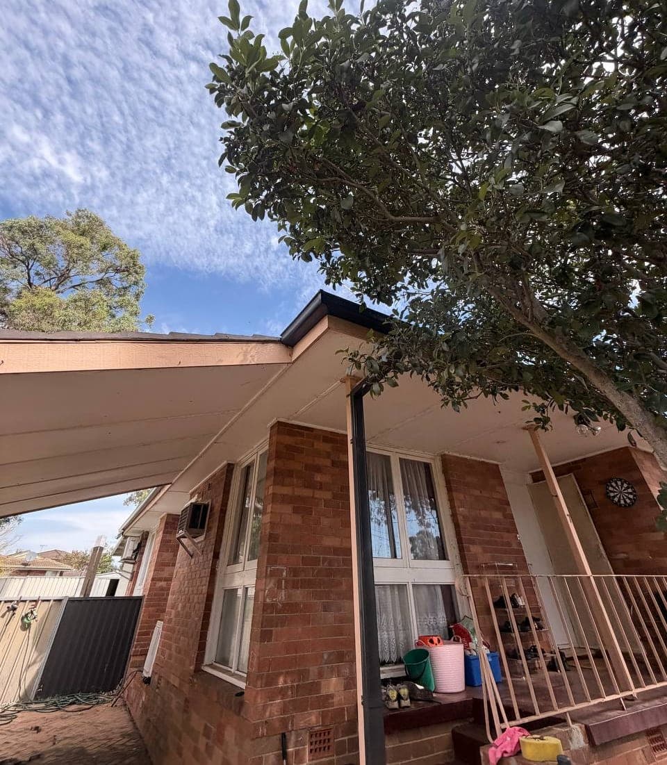 New Colorbond gutter and downpipe replacement Crown Roofers Sydney residential — photo 6 v2