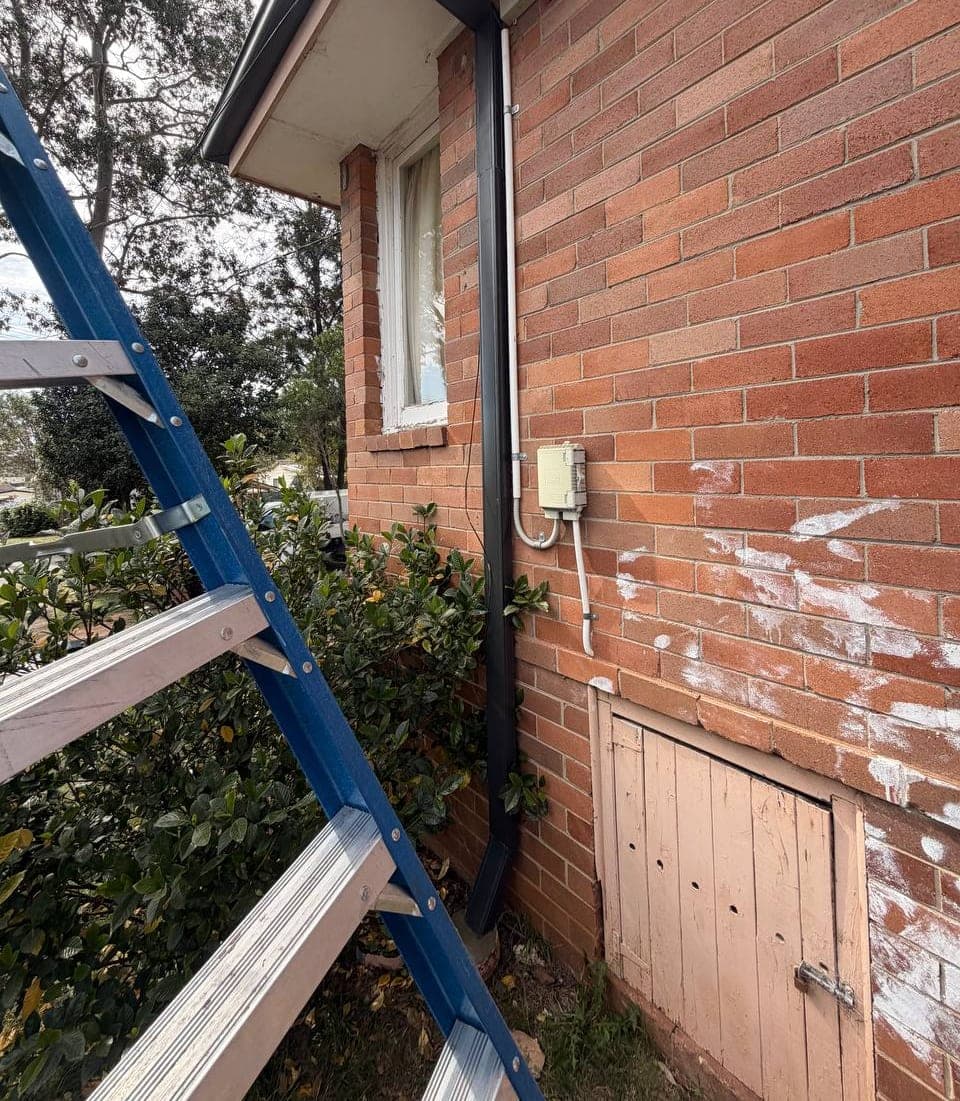 New Colorbond gutter and downpipe replacement Crown Roofers Sydney residential — photo 8 v2