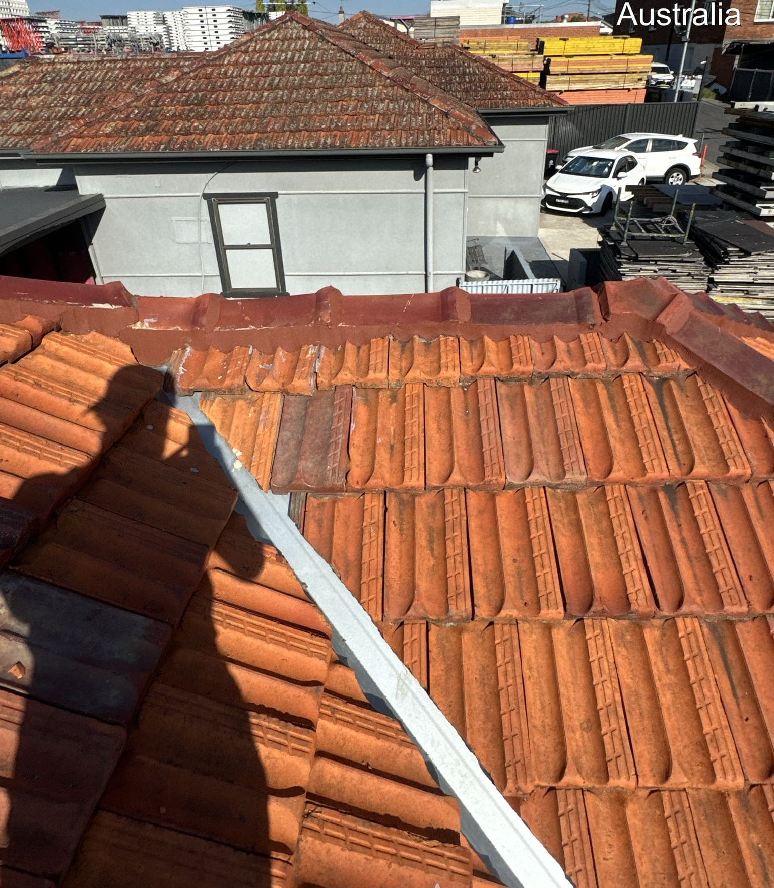Ridge cap rebedding and flexible pointing Crown Roofers Belmore Inner West Sydney — before v2