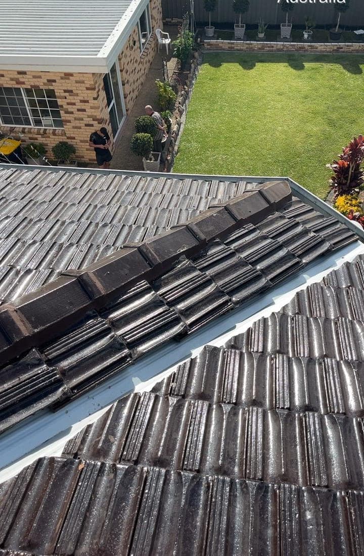 Terracotta tile roof restoration and re-coating Crown Roofers Bexley St George Sydney — photo 2 v2