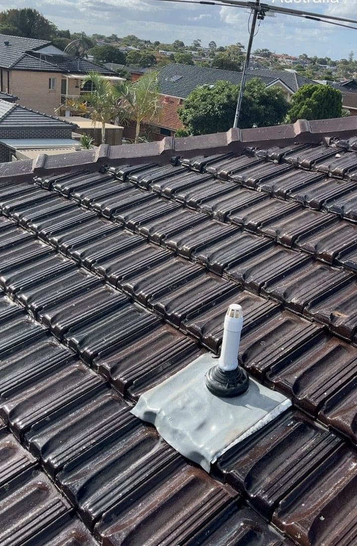 Terracotta tile roof restoration and re-coating Crown Roofers Bexley St George Sydney — photo 6 v2