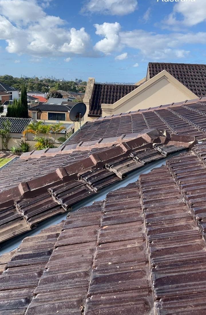 Terracotta tile roof restoration and re-coating Crown Roofers Bexley St George Sydney — photo 13 v2