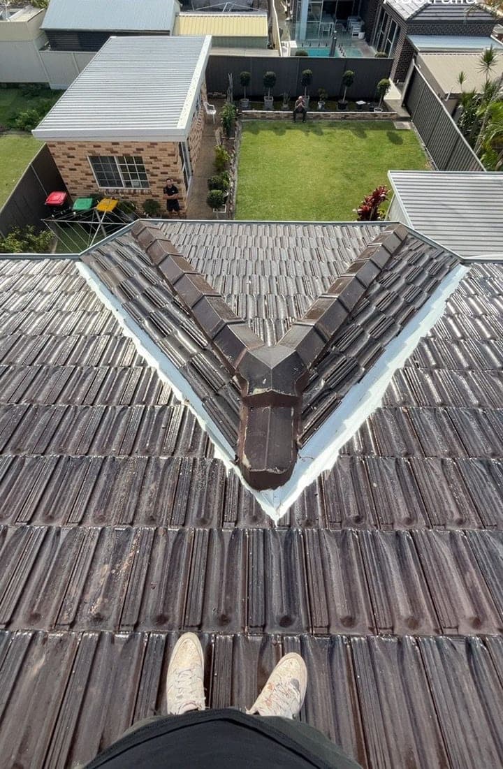 Terracotta tile roof restoration and re-coating Crown Roofers Bexley St George Sydney — photo 32 v2