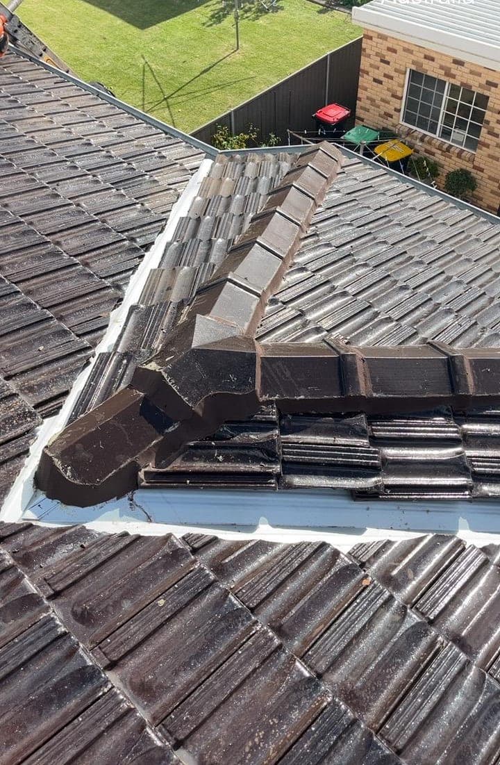 Terracotta tile roof restoration and re-coating Crown Roofers Bexley St George Sydney — photo 49 v2