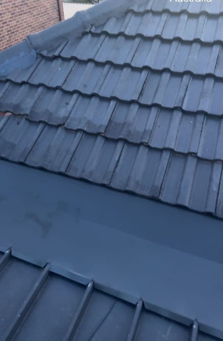 Concrete tile roof restoration with charcoal membrane Crown Roofers Blacktown Western Sydney 2 — photo 1 v2