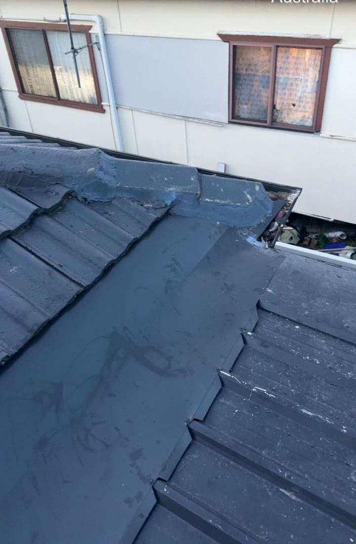 Concrete tile roof restoration with charcoal membrane Crown Roofers Blacktown Western Sydney 2 — photo 2 v2