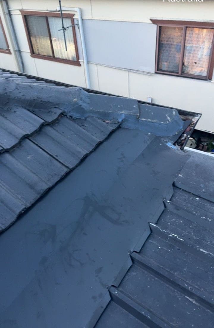 Concrete tile roof restoration with charcoal membrane Crown Roofers Blacktown Western Sydney 2 — photo 4 v2