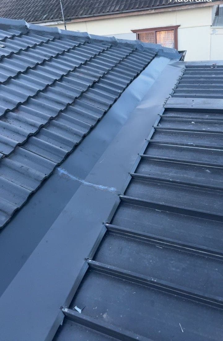 Concrete tile roof restoration with charcoal membrane Crown Roofers Blacktown Western Sydney 2 — photo 10 v2