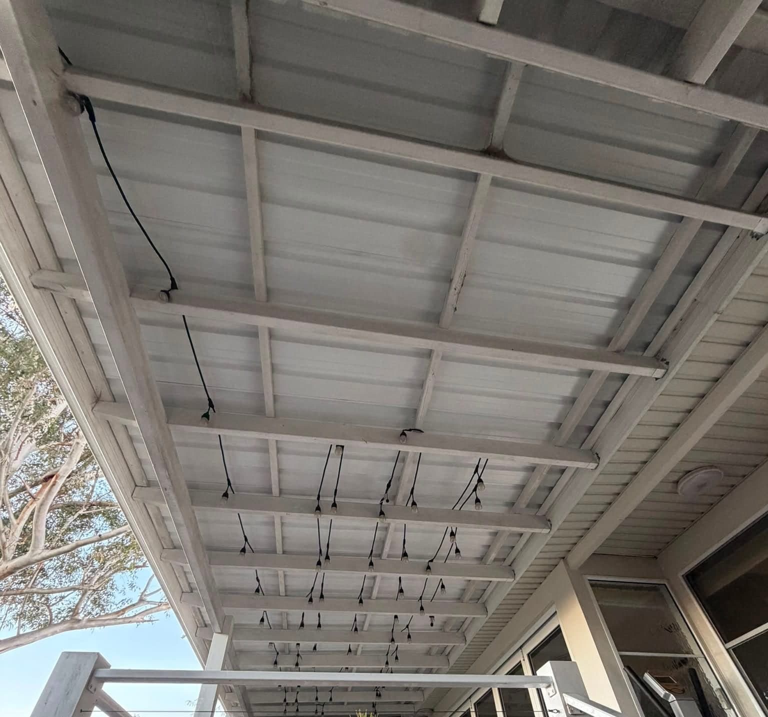 Colorbond and polycarbonate re-sheet Crown Roofers Emu Heights — finished carport sheeting from the driveway