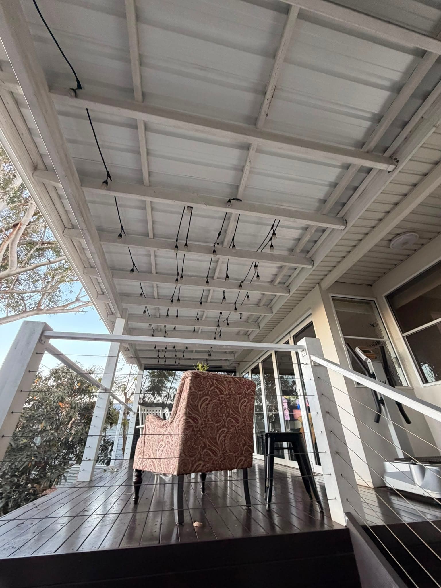 Colorbond and polycarbonate re-sheet Crown Roofers Emu Heights — carport roofline looking toward the entry