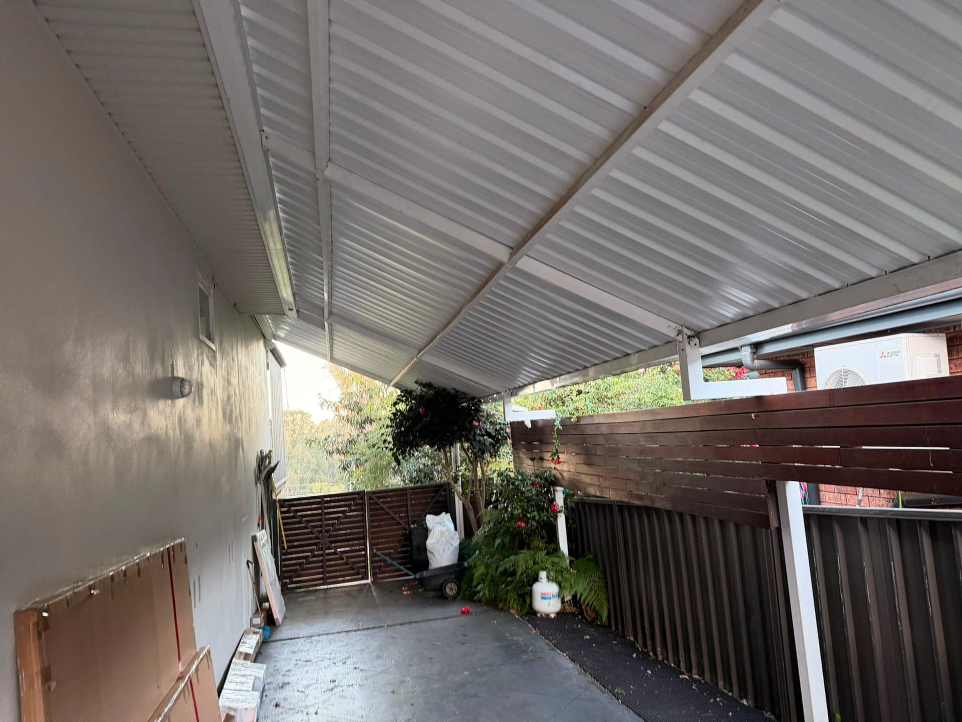 Colorbond and polycarbonate re-sheet Crown Roofers Emu Heights — back deck roof after re-sheeting