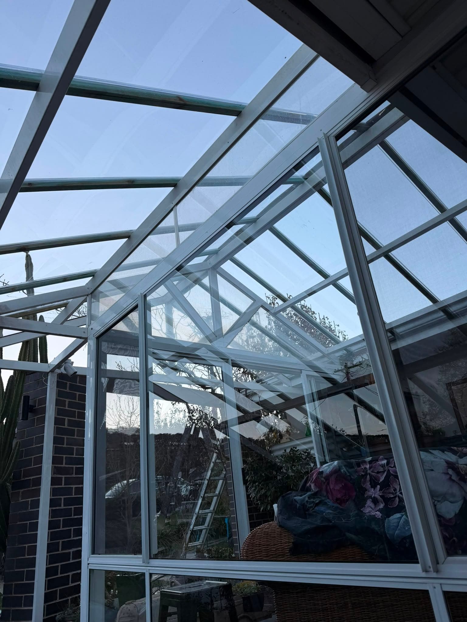 Colorbond and polycarbonate re-sheet Crown Roofers Emu Heights — clear polycarbonate sheeting on the front section