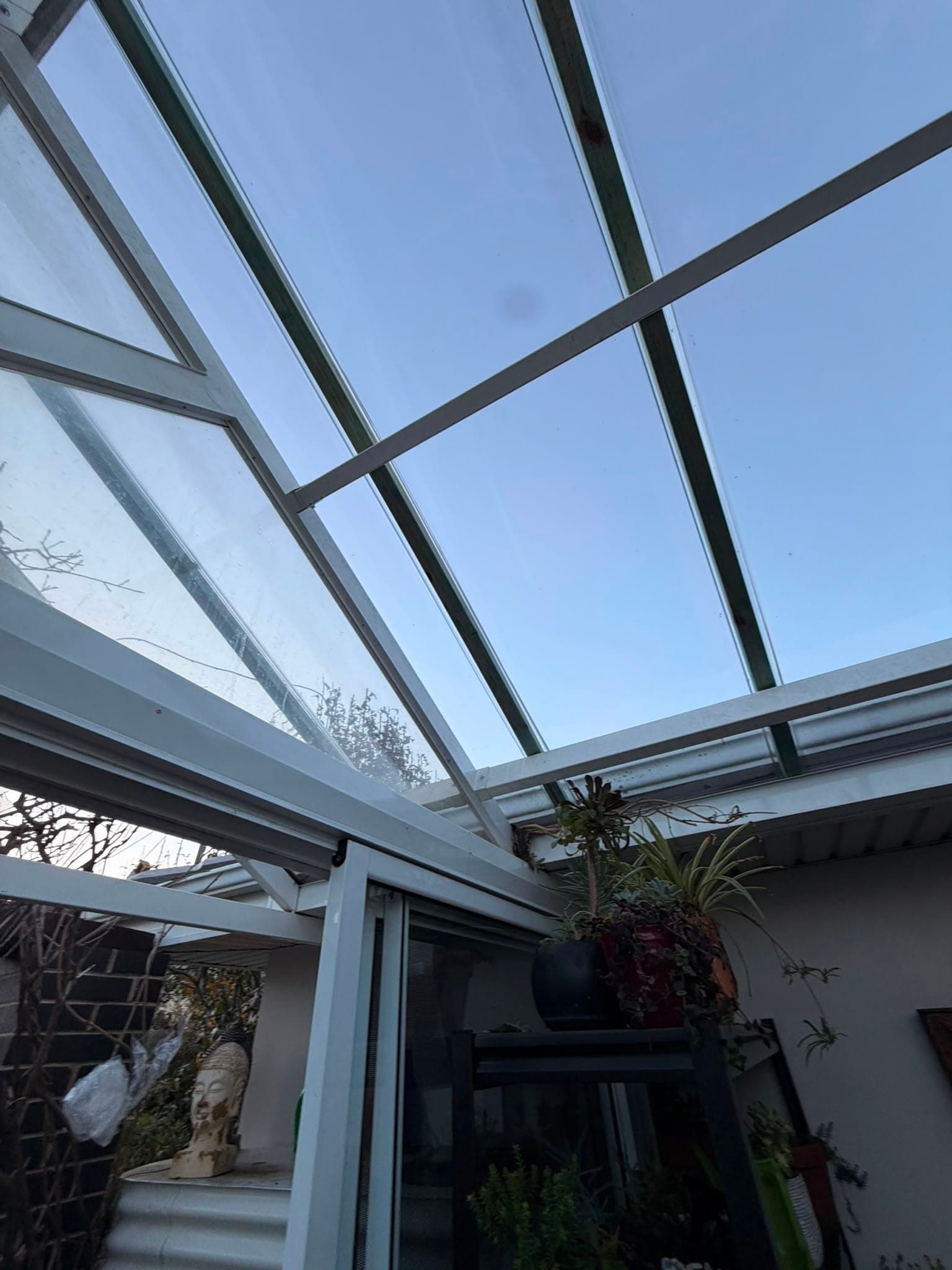 Colorbond and polycarbonate re-sheet Crown Roofers Emu Heights — daylight through the finished polycarbonate roof