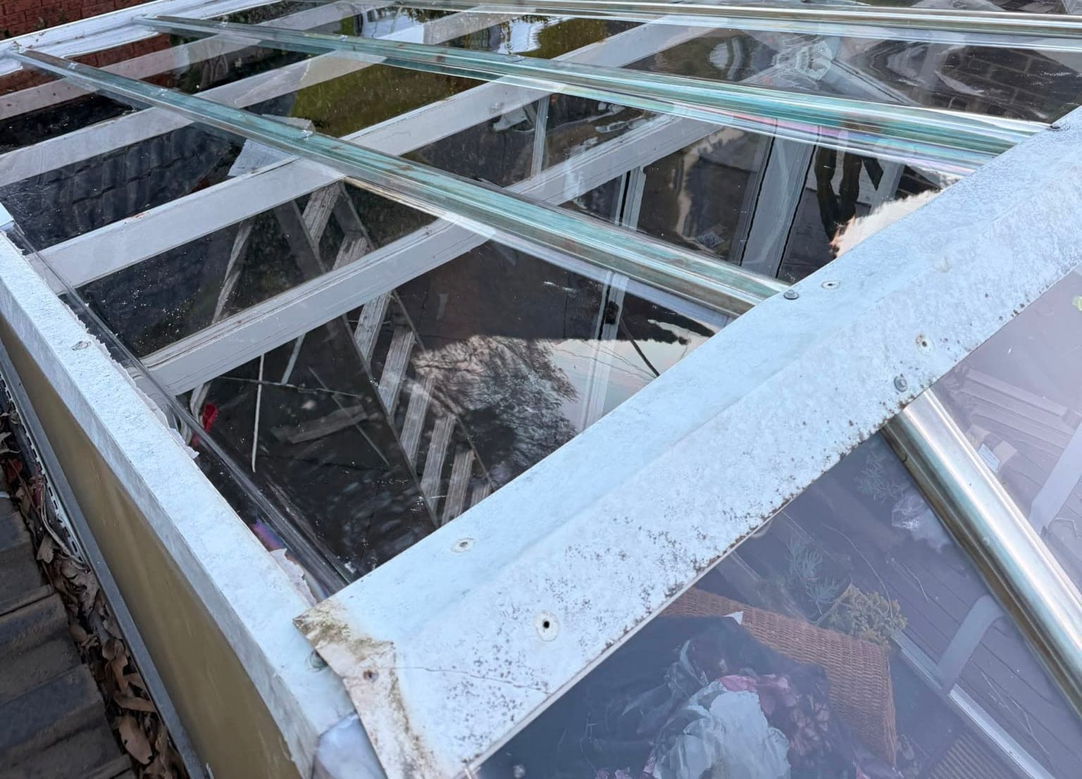 Colorbond and polycarbonate re-sheet Crown Roofers Emu Heights — completed re-sheet across all three roof sections