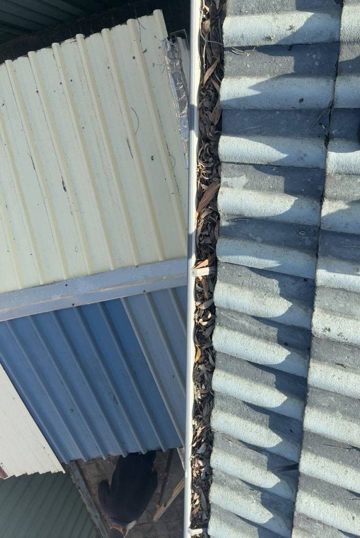 Residential gutter cleaning — Crown Roofers project Emerton Western Sydney — cleaned gutter line with full flow path restored