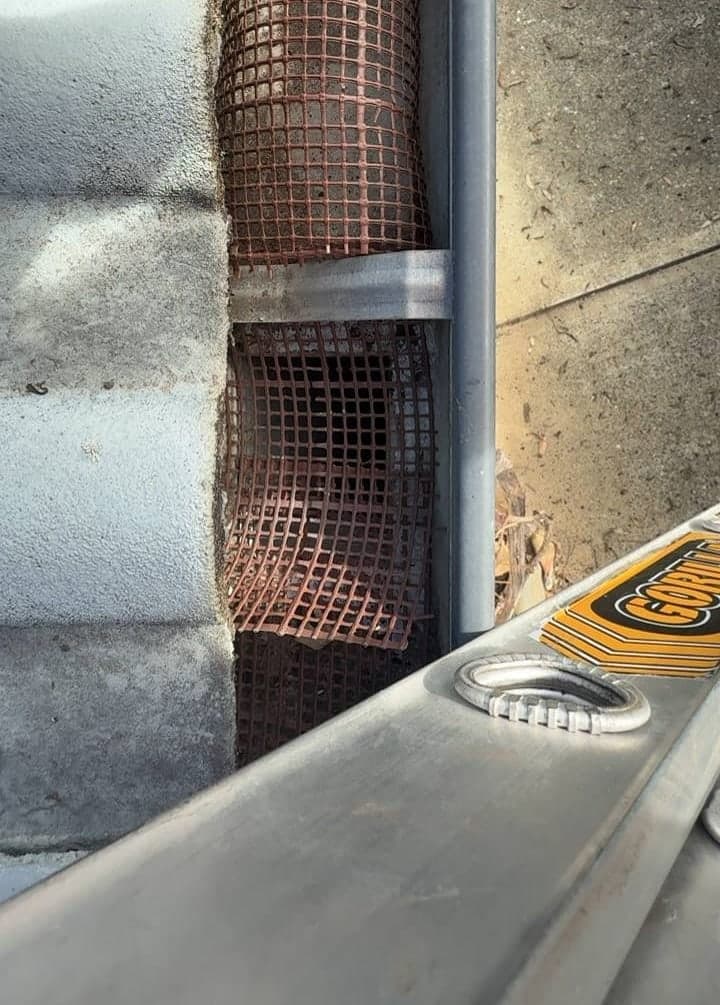 Residential gutter cleaning — Crown Roofers project Emerton Western Sydney — clean downpipe entry — clear water path