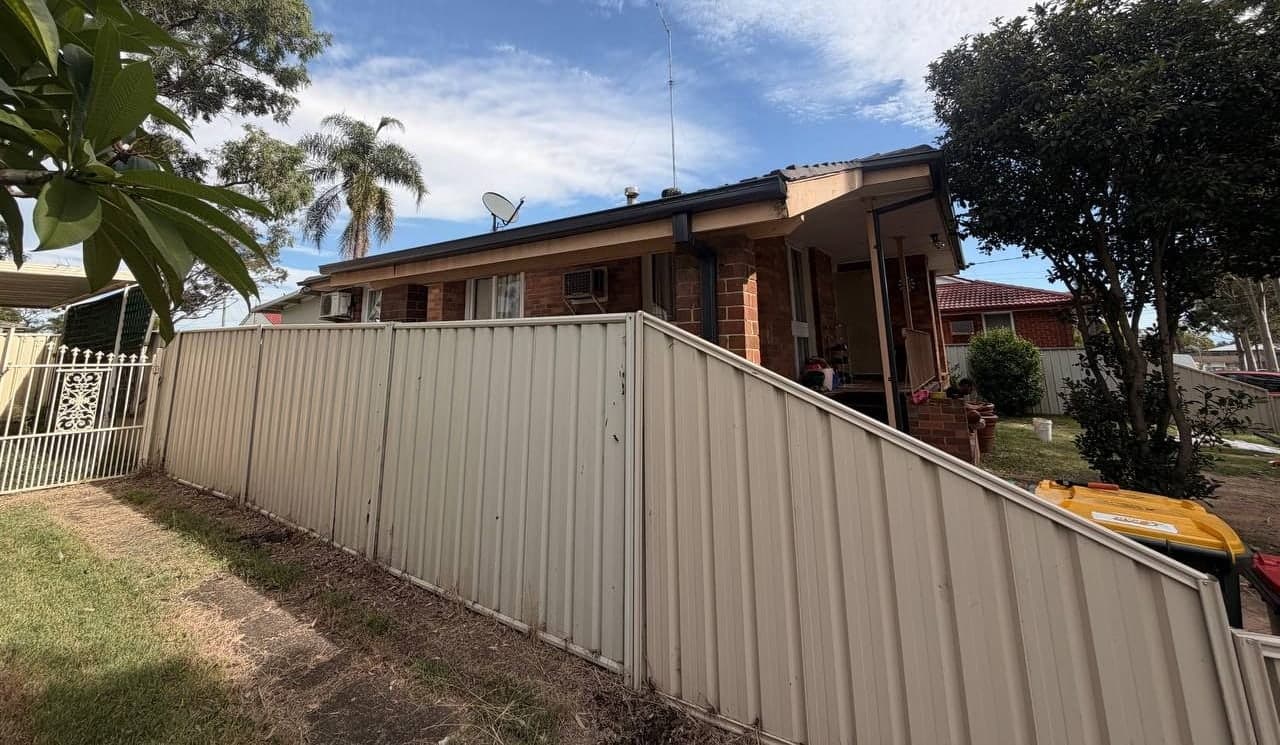 New Colorbond gutter and downpipe replacement Crown Roofers Sydney residential — photo 3 v2