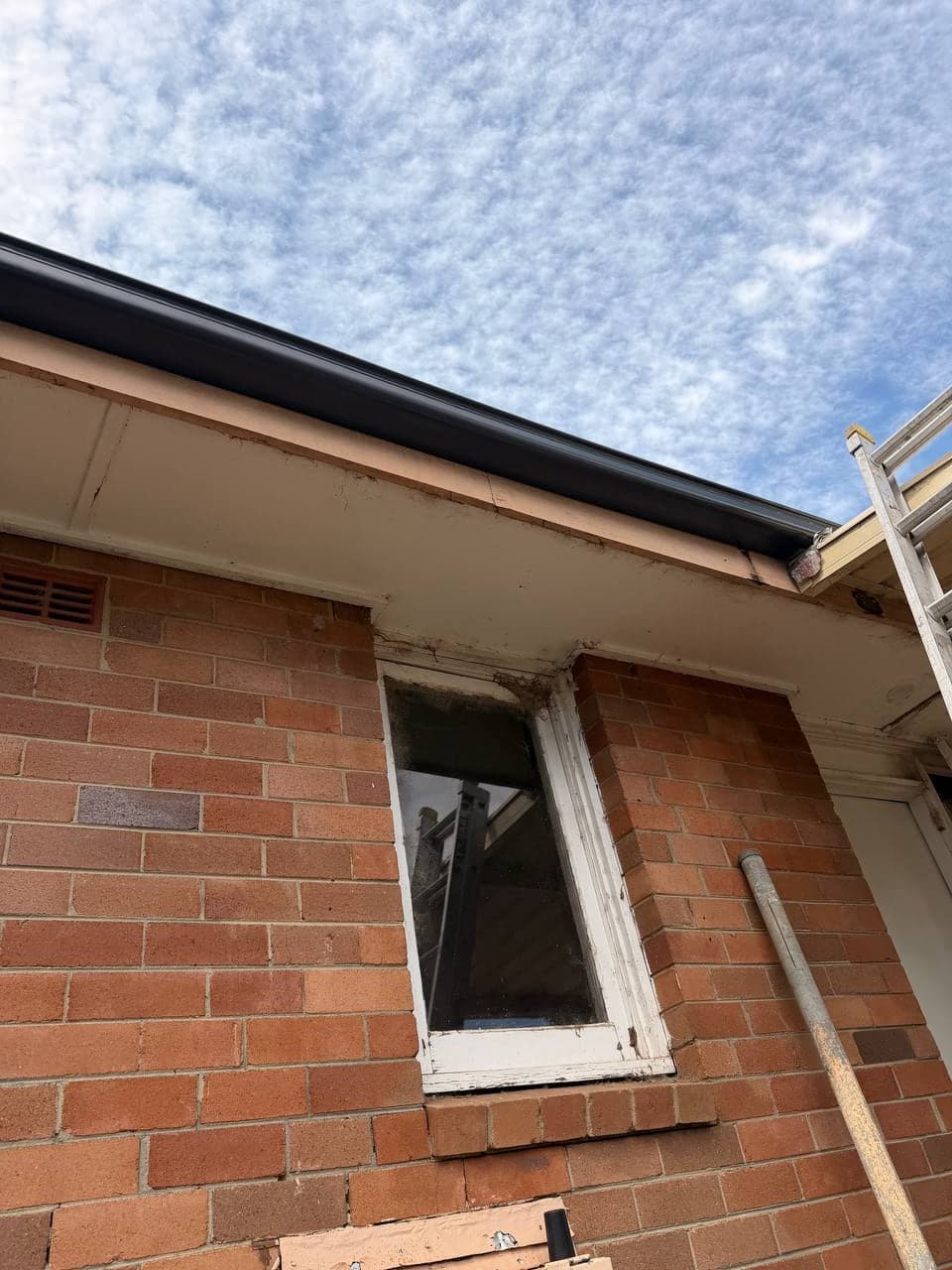 Corroded downpipe before replacement, Riverwood, Sydney