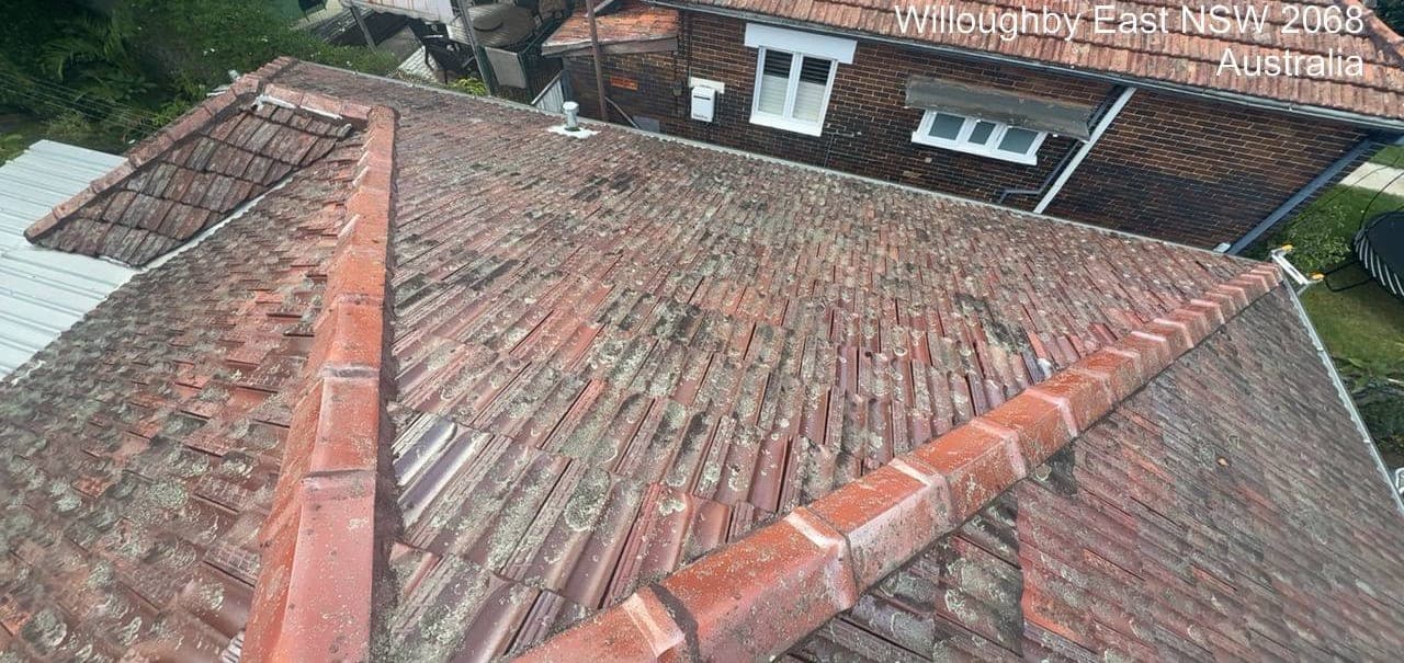 Heritage terracotta tile roof restoration — Crown Roofers project Willoughby East Lower North Shore Sydney — before restoration — heritage tile profile showing accumulated weathering