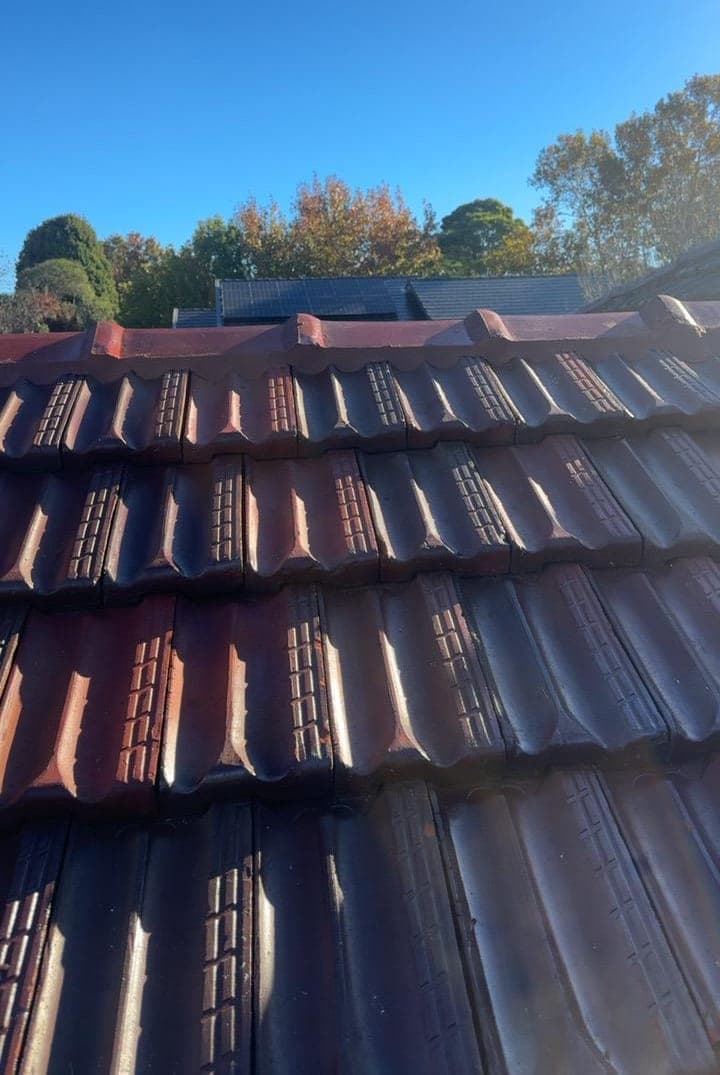 Heritage terracotta tile roof restoration — Crown Roofers project Willoughby East Lower North Shore Sydney — restoration detail — clean tile-to-flashing transition