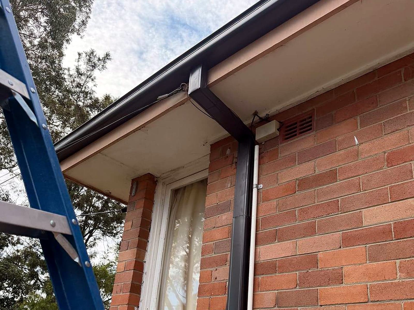 New downpipe installed and connected to new guttering, Sydney