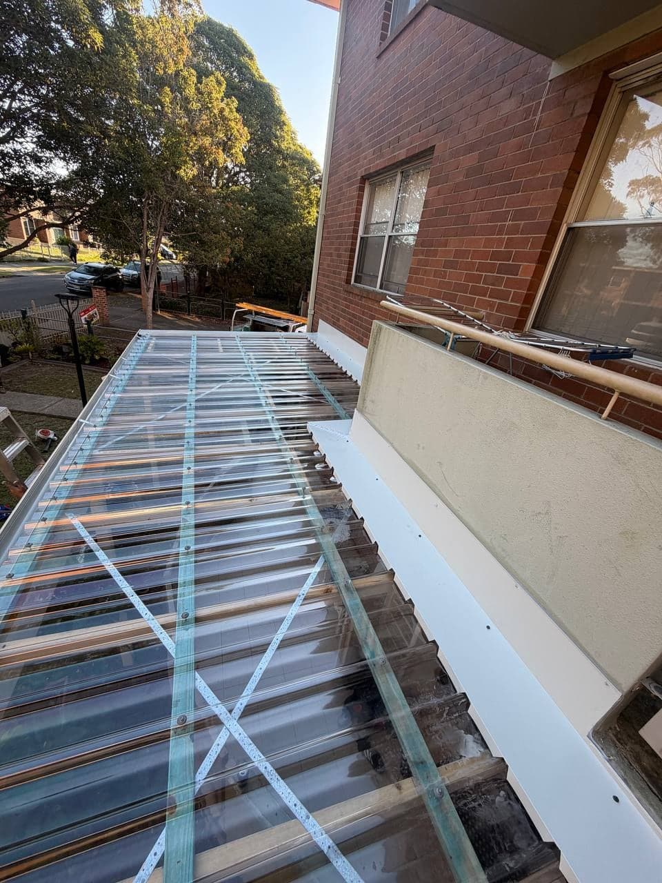New polycarbonate sheeting on a pergola roof, Riverwood, Sydney