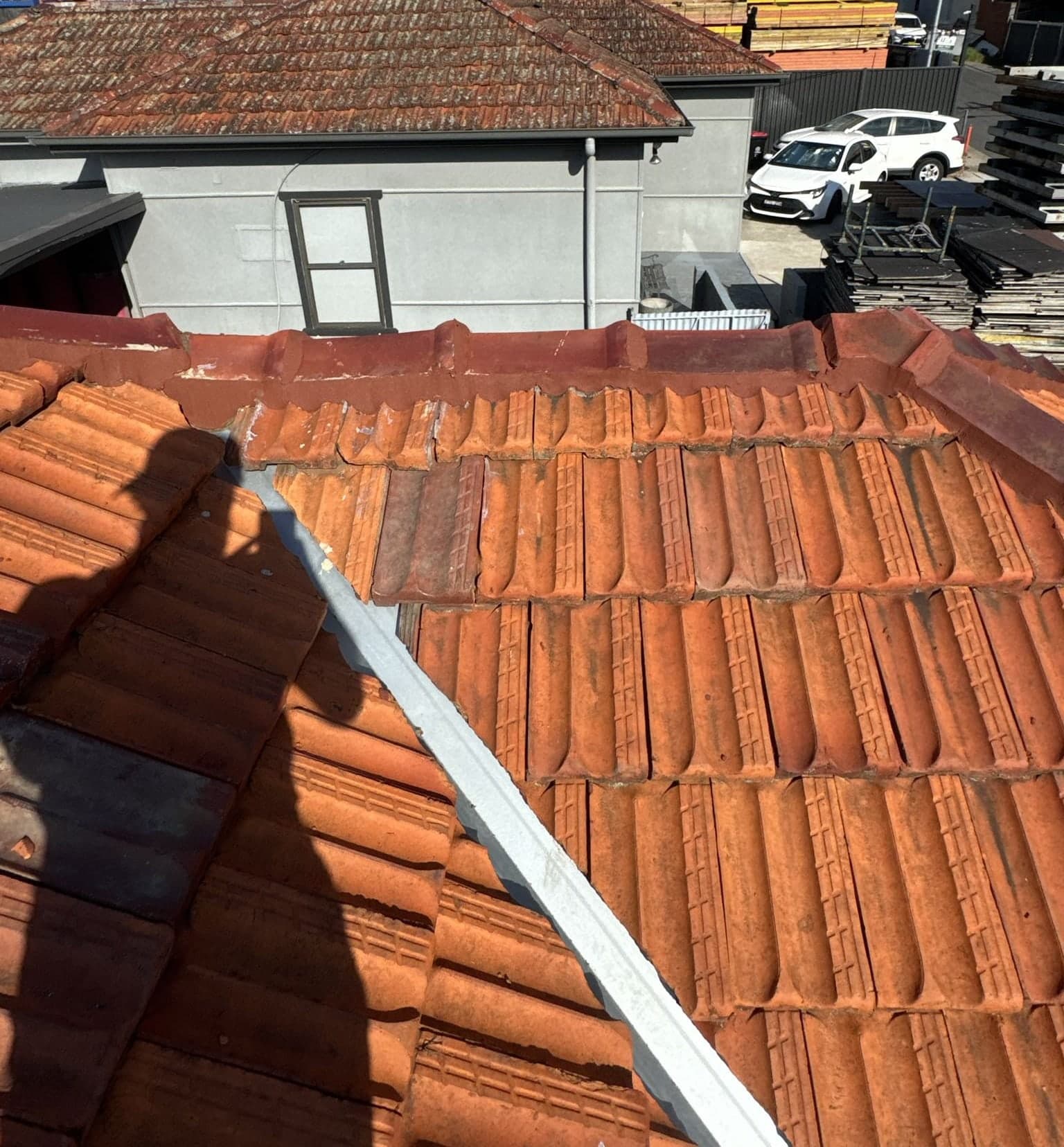 Ridge cap rebedding and flexible pointing Crown Roofers Belmore Inner West Sydney — before v2