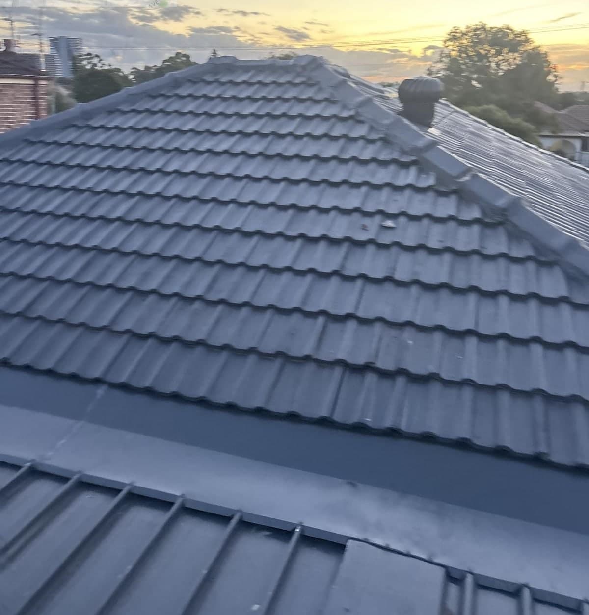 Concrete tile roof restoration with charcoal membrane Crown Roofers Blacktown Western Sydney — photo 2 v2