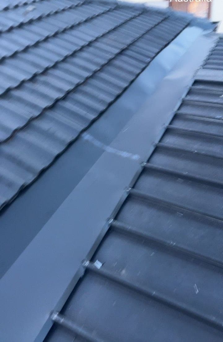 Concrete tile roof restoration with charcoal membrane Crown Roofers Blacktown Western Sydney 2 — photo 9 v2