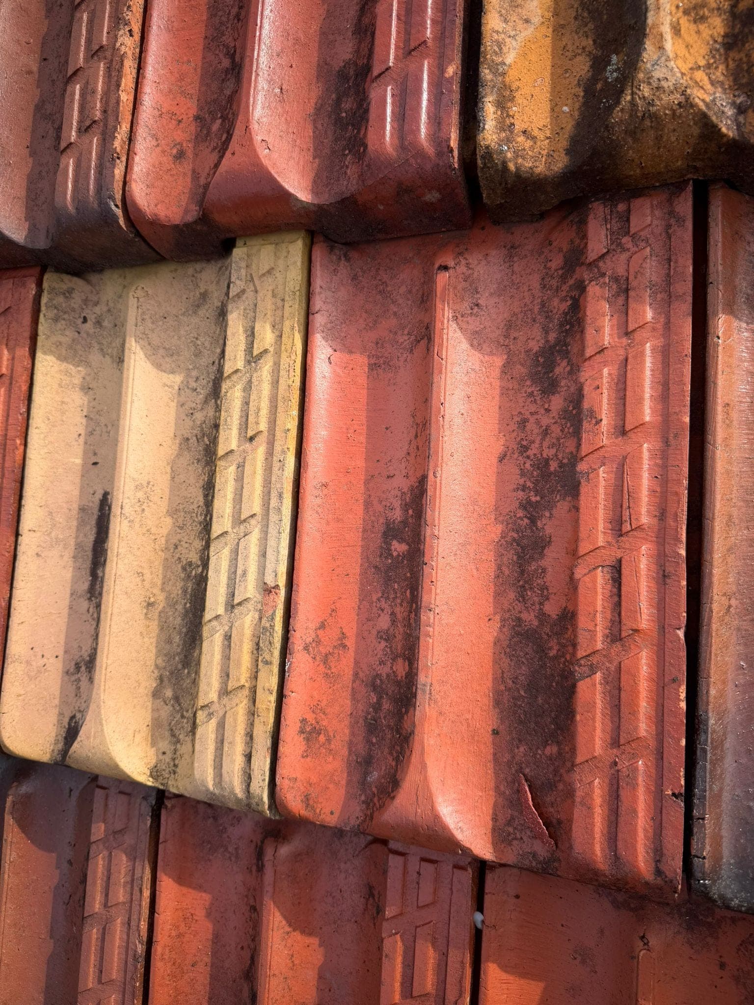 Aged terracotta tile roof with solar panels — Crown Roofers tile restoration project Epping North Shore Sydney — photo 29