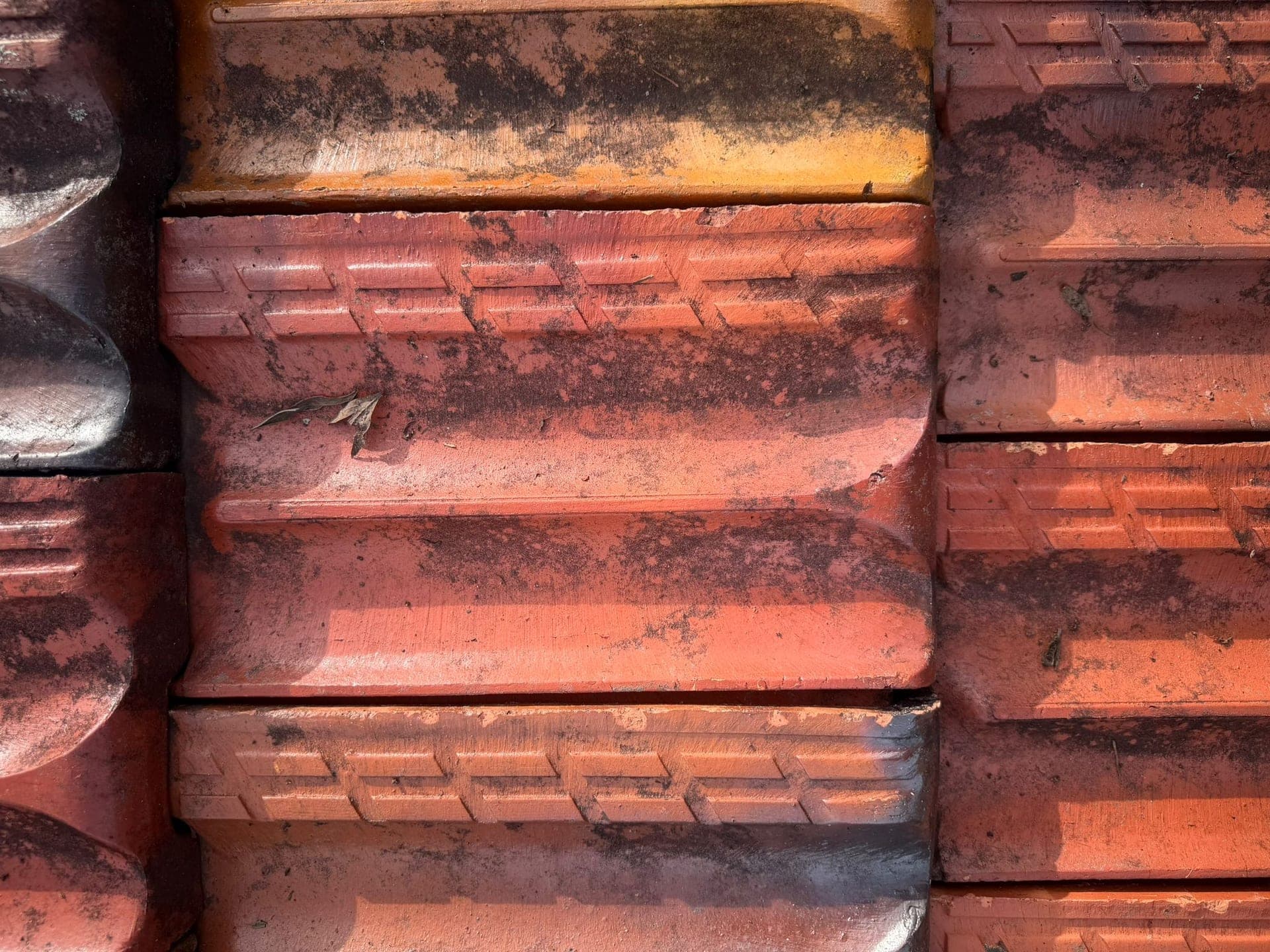 Aged terracotta tile roof with solar panels — Crown Roofers tile restoration project Epping North Shore Sydney — photo 30